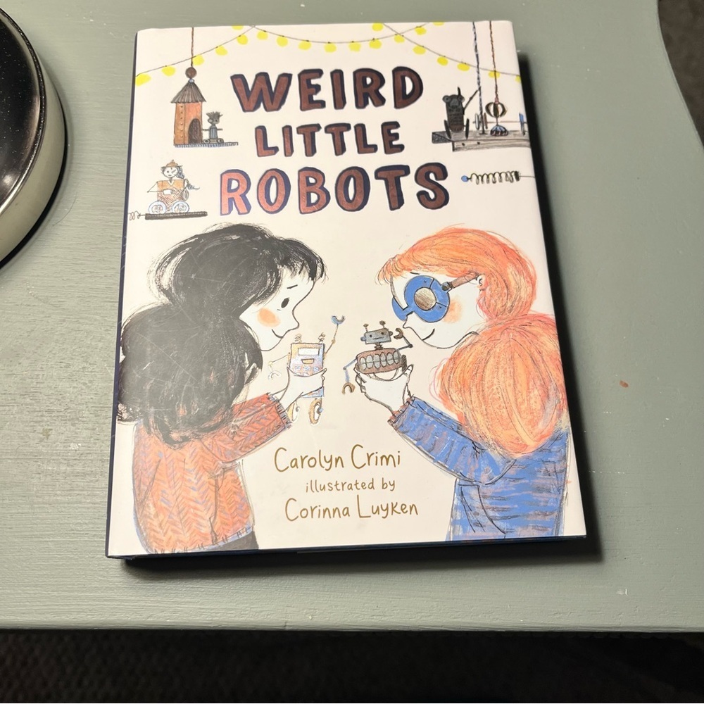 Weird Little Robots - Kids Book (White with Orange & Blue Illustration) by Crimi